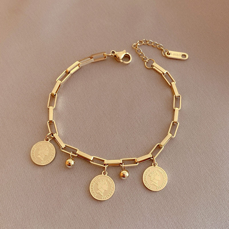 Close-up image of Queen's Gleam Bracelet on a white background