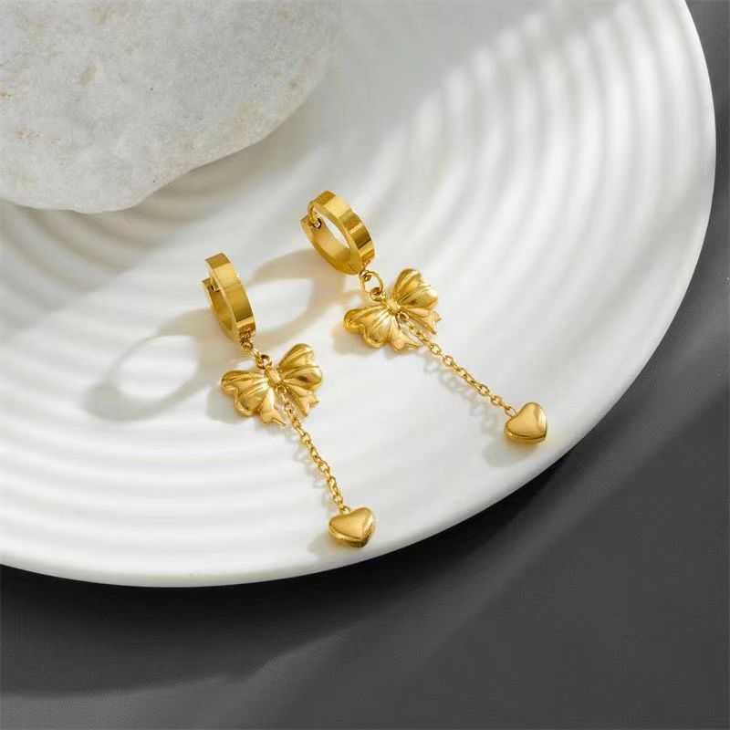 heartstrings earrings in gold finish; stylish heartstrings earrings for women