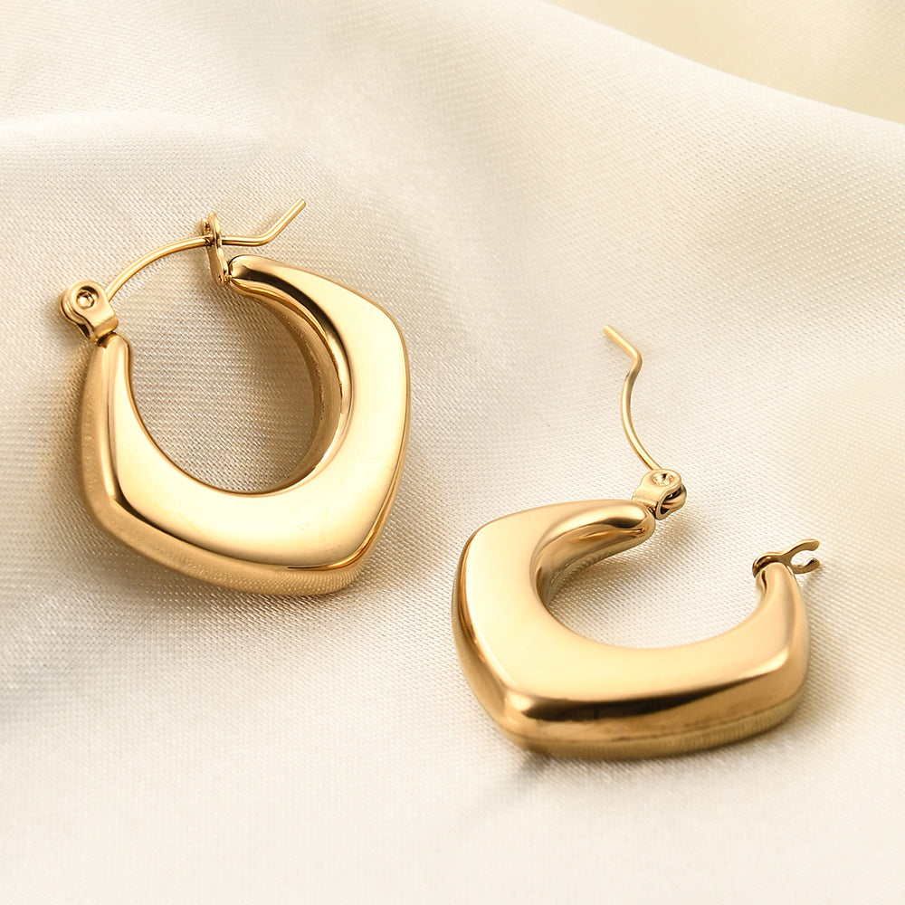 golden edge earrings in gold finish; stylish golden edge earrings for women