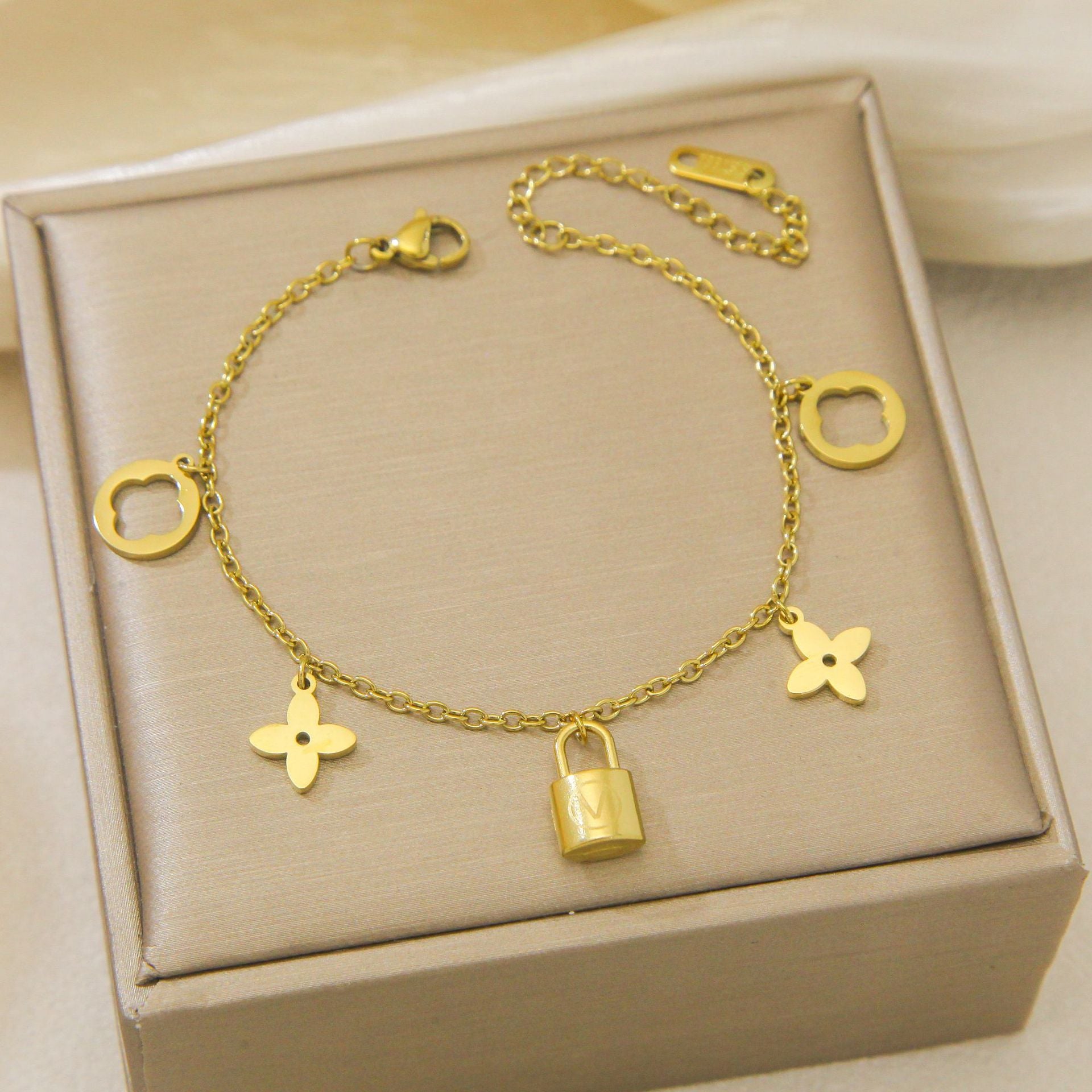 Close-up image of Lock & Bloom Bracelet on a white background