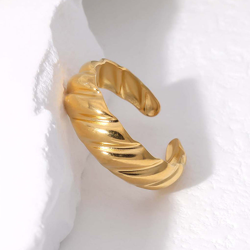 twist glow ring in gold finish; elegant twist glow ring for women
