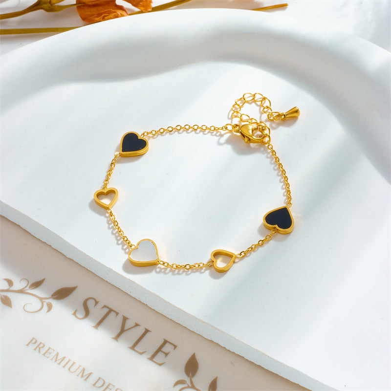 Close-up image of Twin Hearts Bracelet on a white background