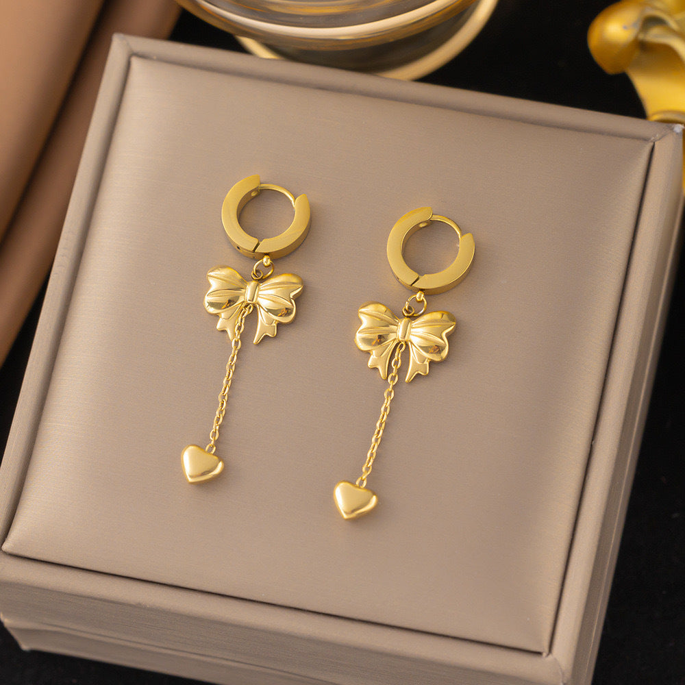 heartstrings earrings in gold finish; stylish heartstrings earrings for women