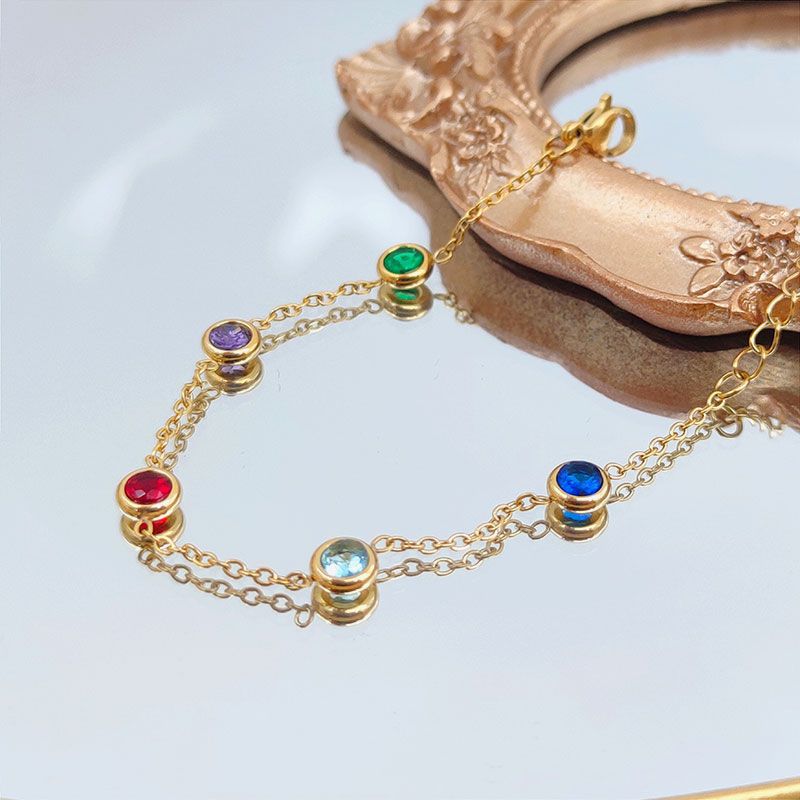 Close-up image of Rainbow Dots Bracelet on a white background