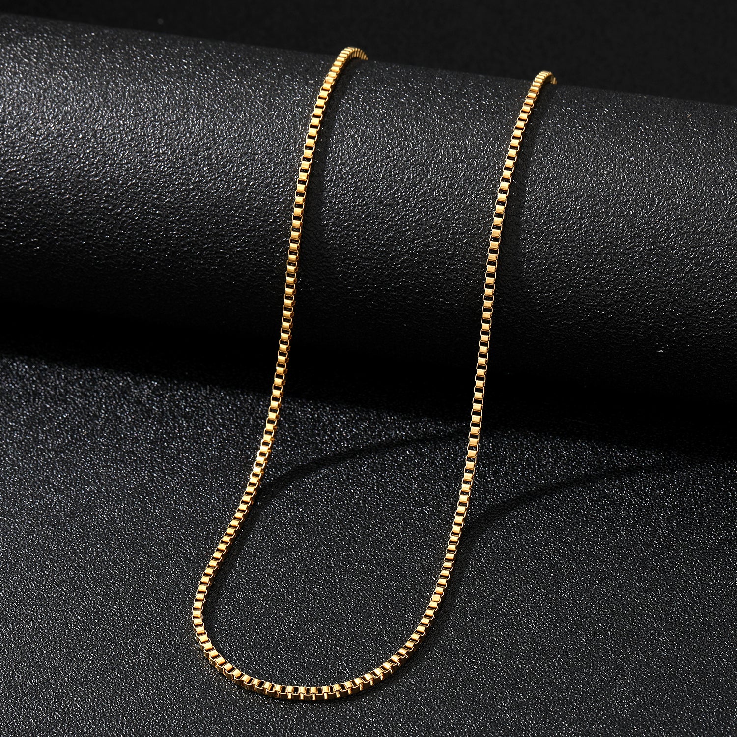 Elegant close-up of Core Luxe Chain displayed on a velvet stand