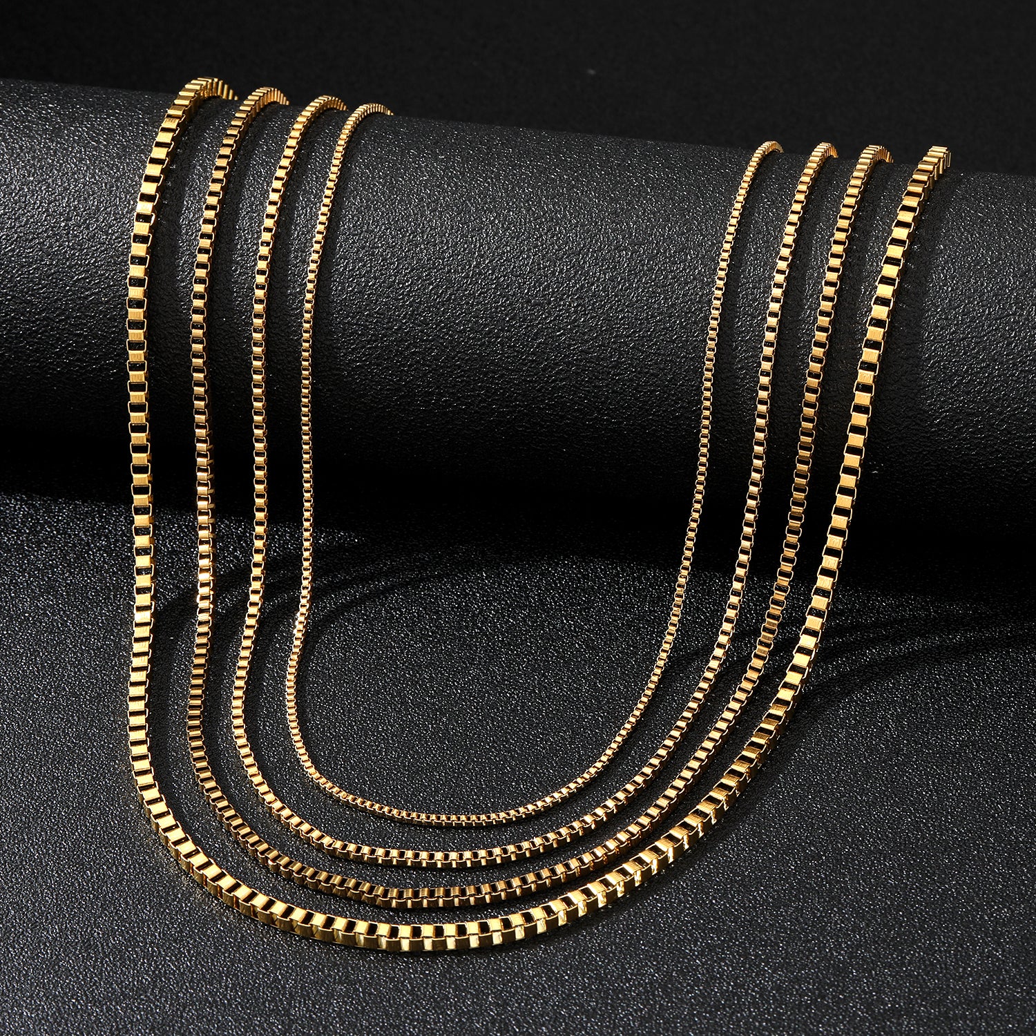 Elegant close-up of Core Luxe Chain displayed on a velvet stand