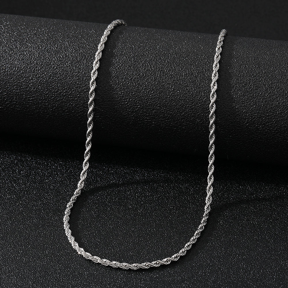 Elegant close-up of Twist of Silver Necklace displayed on a velvet stand
