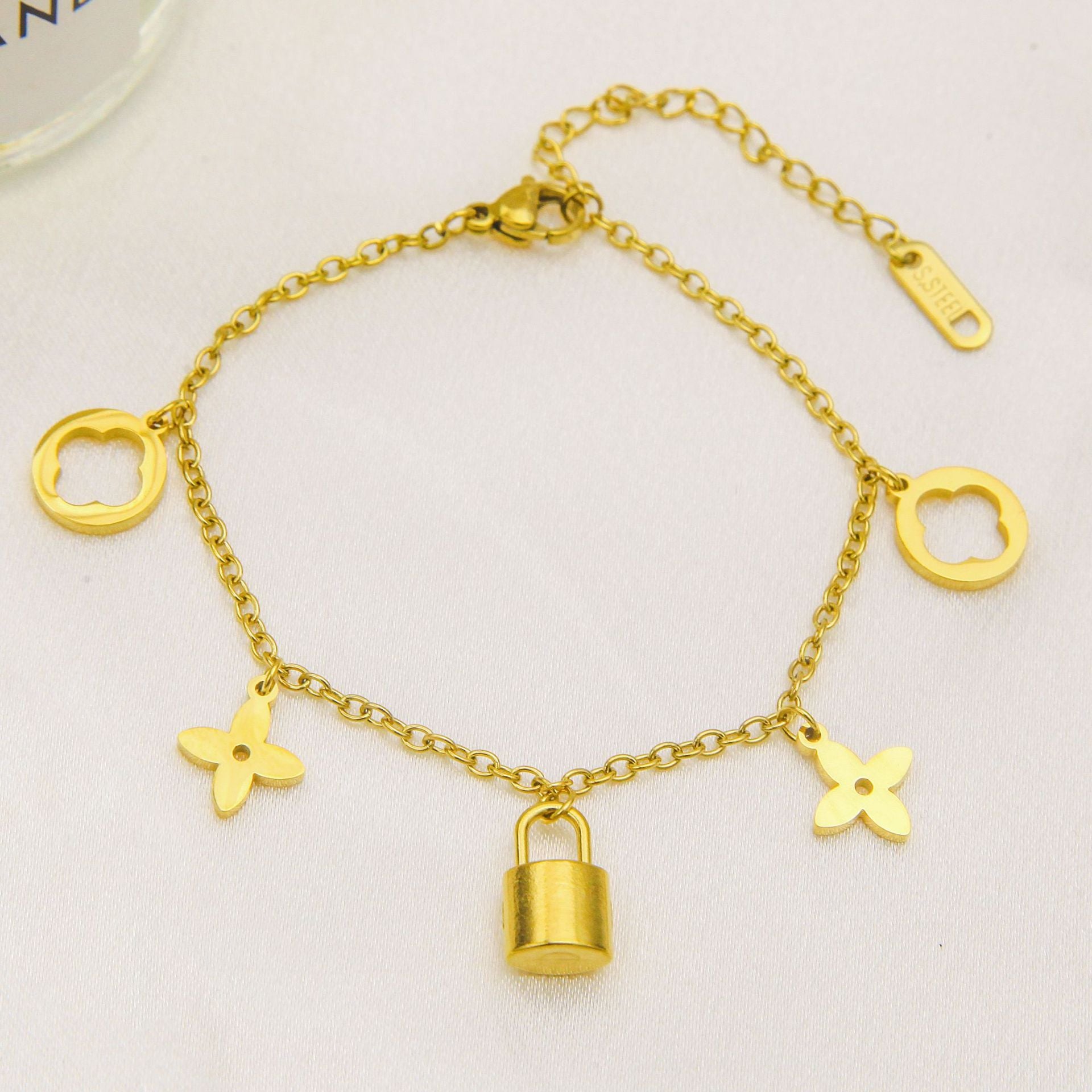 Close-up image of Lock & Bloom Bracelet on a white background