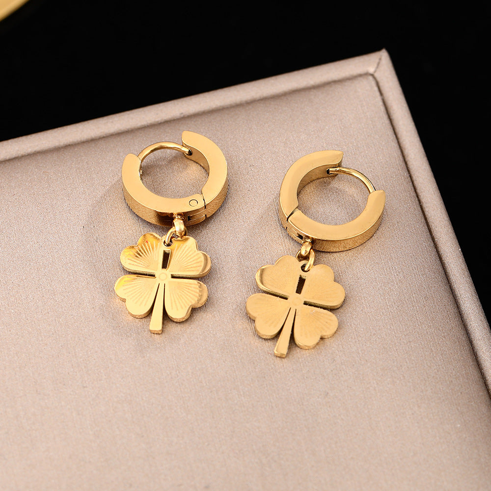 lucky bloom earrings in gold finish; stylish lucky bloom earrings for women