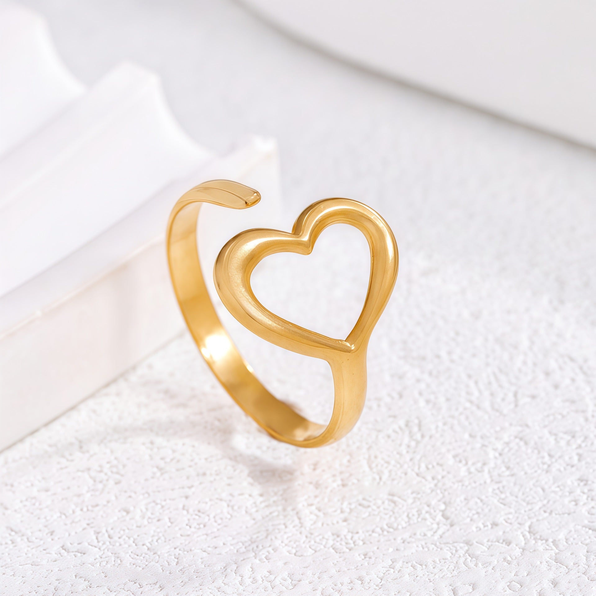 tiny love ring in gold finish; elegant tiny love ring for women