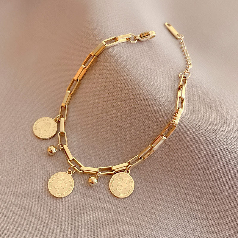 Close-up image of Queen's Gleam Bracelet on a white background