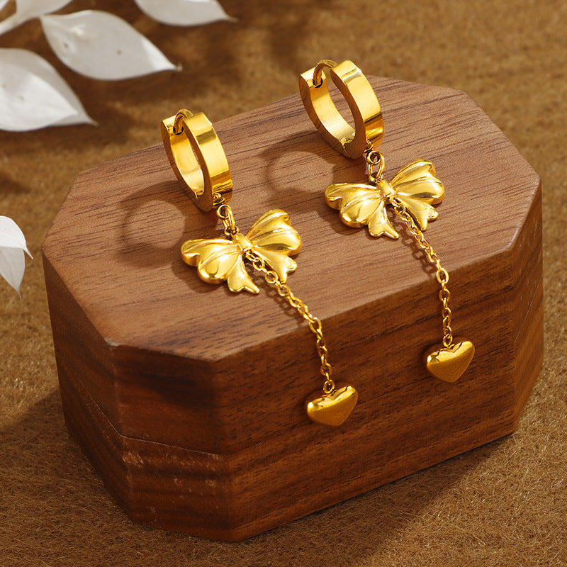 heartstrings earrings in gold finish; stylish heartstrings earrings for women