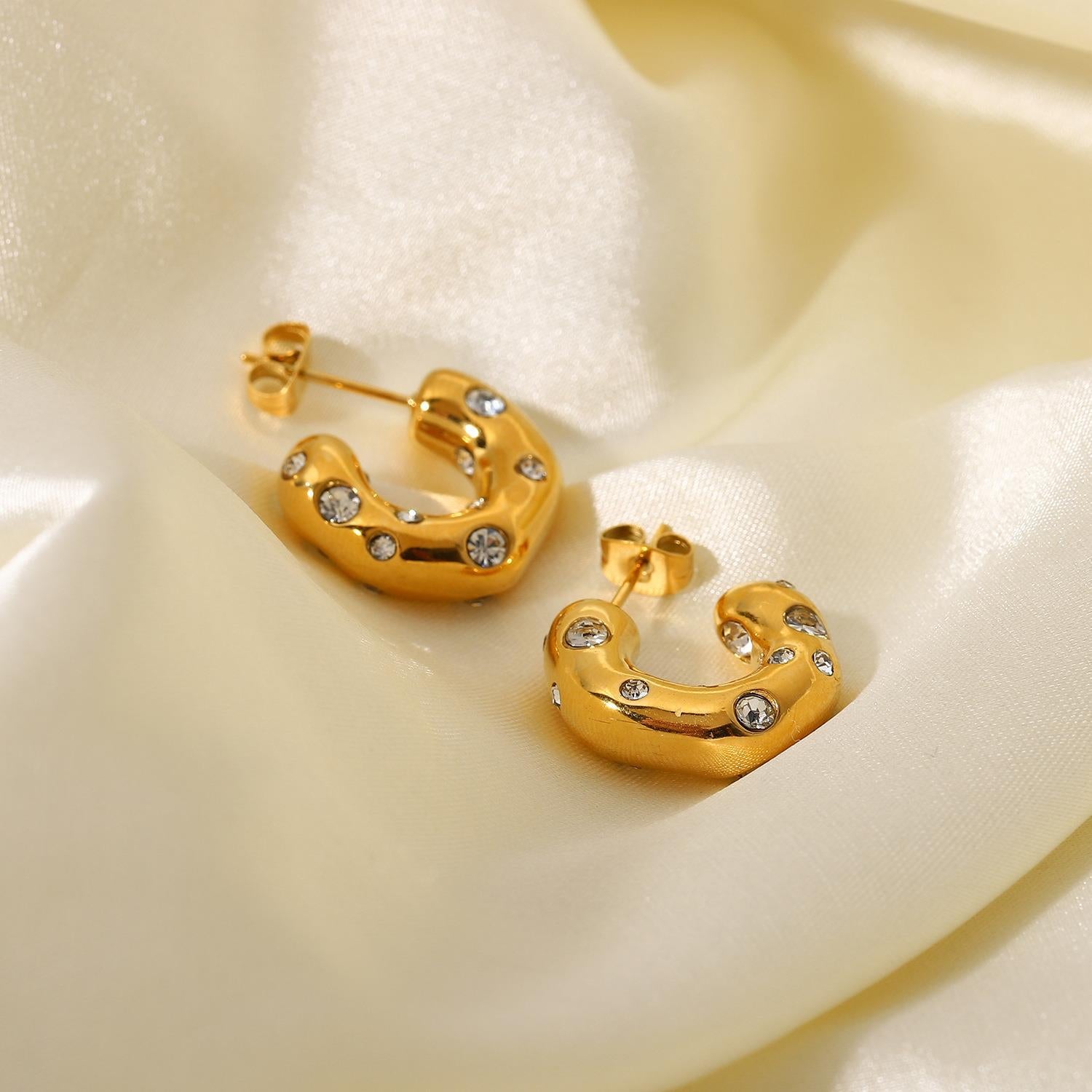 gleam loop earrings in gold finish; stylish gleam loop earrings for women