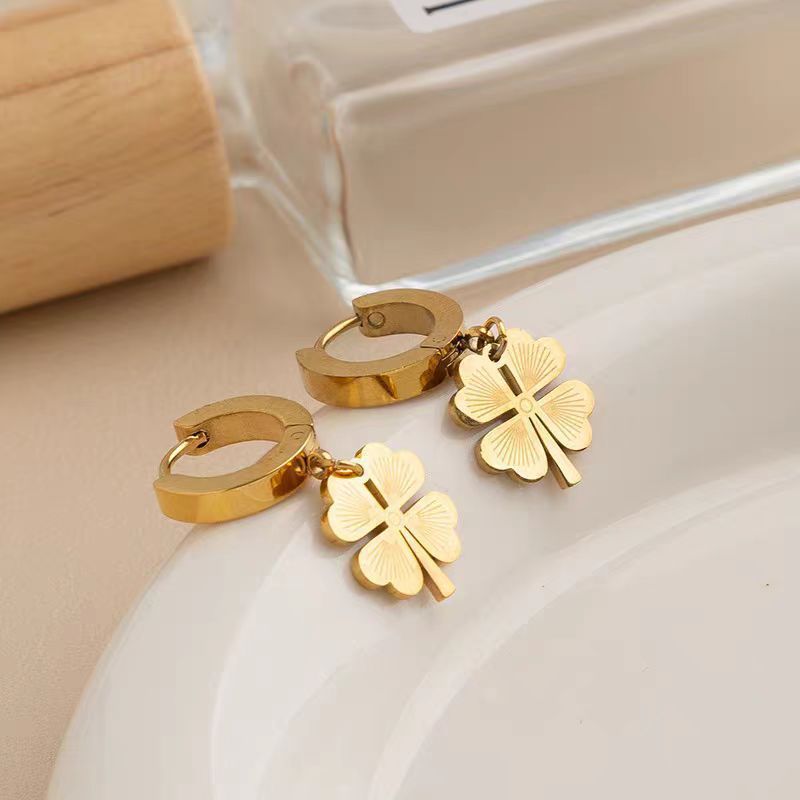 lucky bloom earrings in gold finish; stylish lucky bloom earrings for women