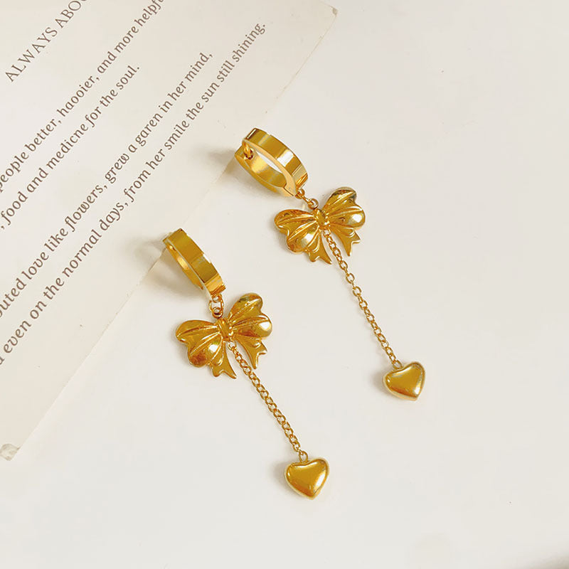 heartstrings earrings in gold finish; stylish heartstrings earrings for women