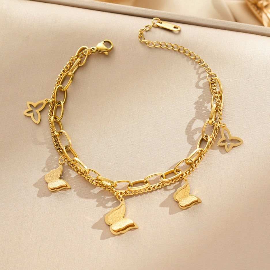 Close-up image of Little Butterfly Bracelet on a white background