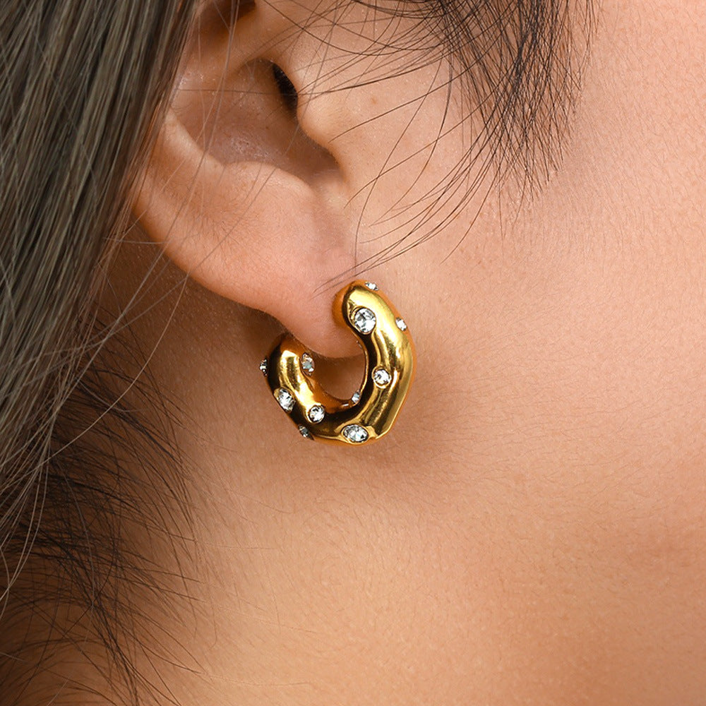 gleam loop earrings in gold finish; stylish gleam loop earrings for women