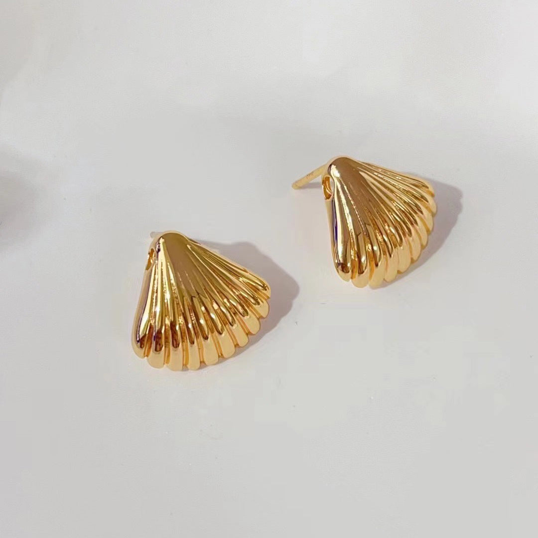 shell gleam earrings in gold finish; stylish shell gleam earrings for women