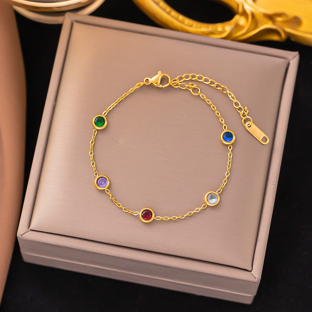 Close-up image of Rainbow Dots Bracelet on a white background
