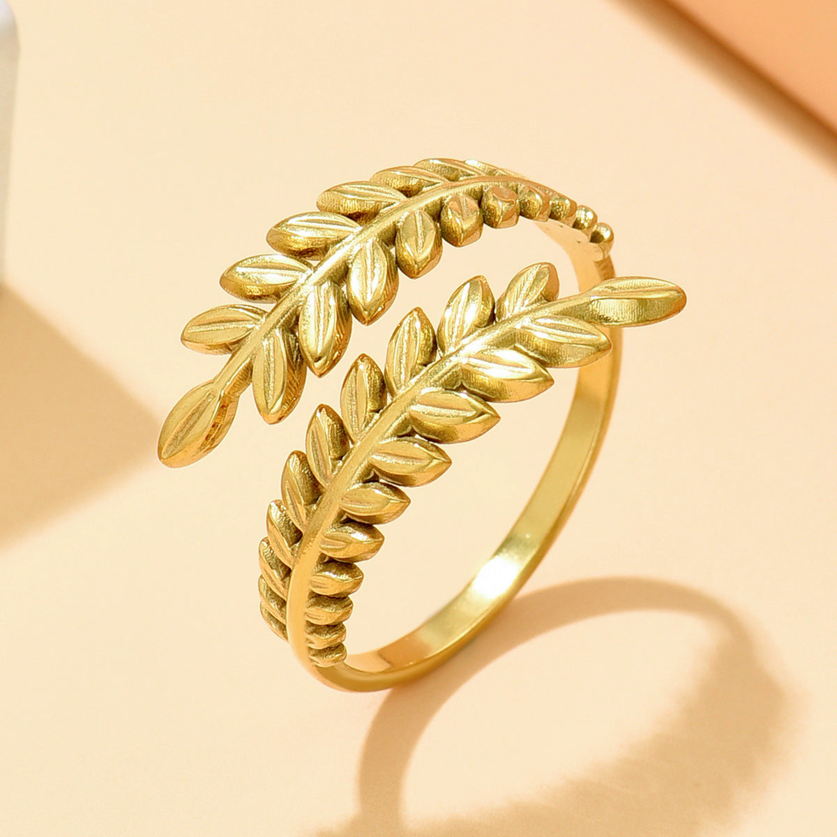 twin olive ring in gold finish; elegant twin olive ring for women