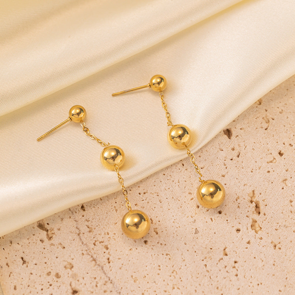 golden orbit earrings in gold finish; stylish golden orbit earrings for women