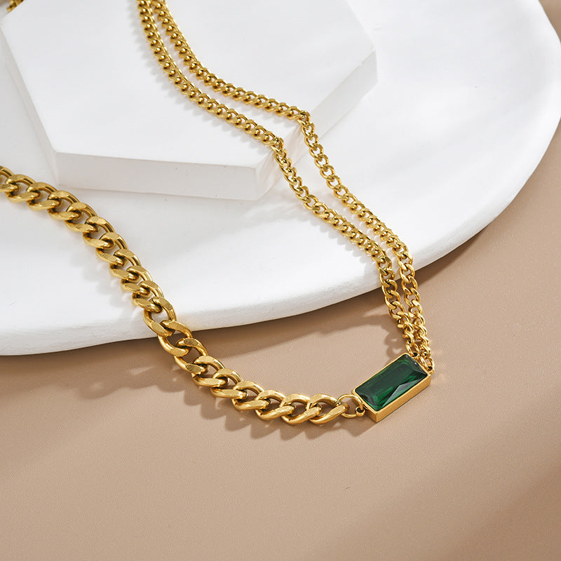 Elegant close-up of Emerald Link displayed on a velvet stand
