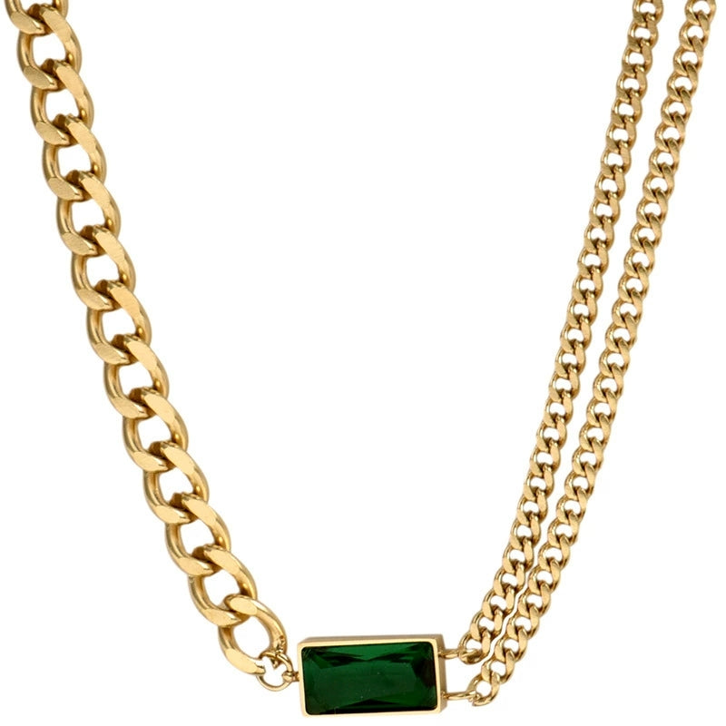 Elegant close-up of Emerald Link displayed on a velvet stand