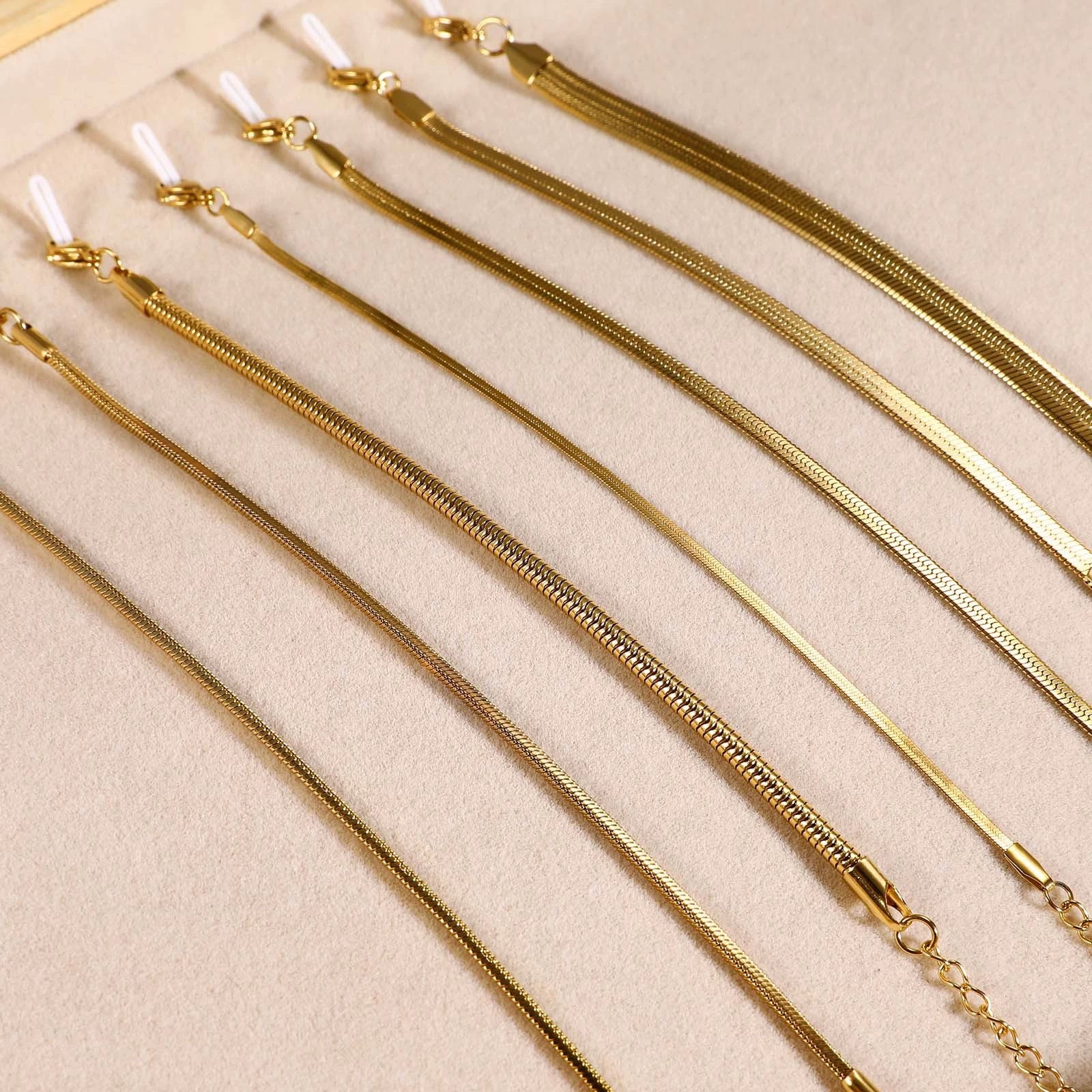 Close-up image of Golden Glide Bracelet on a white background