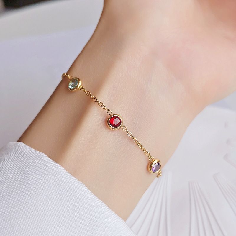 Close-up image of Rainbow Dots Bracelet on a white background