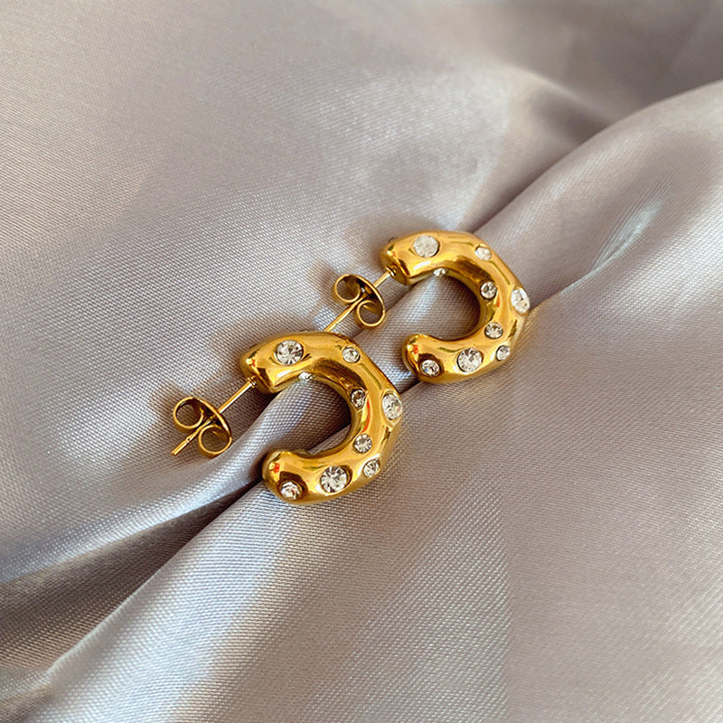 gleam loop earrings in gold finish; stylish gleam loop earrings for women