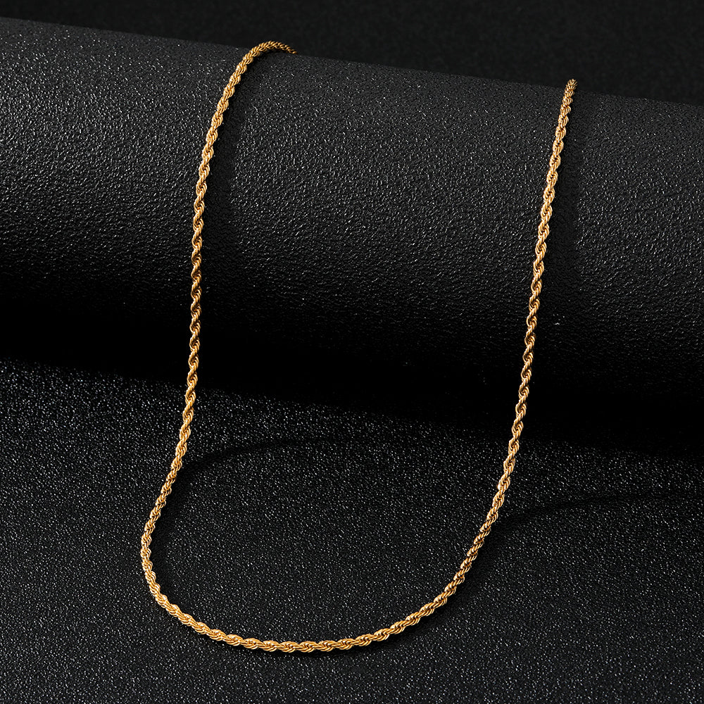 Elegant close-up of Twist of Gold Necklace displayed on a velvet stand
