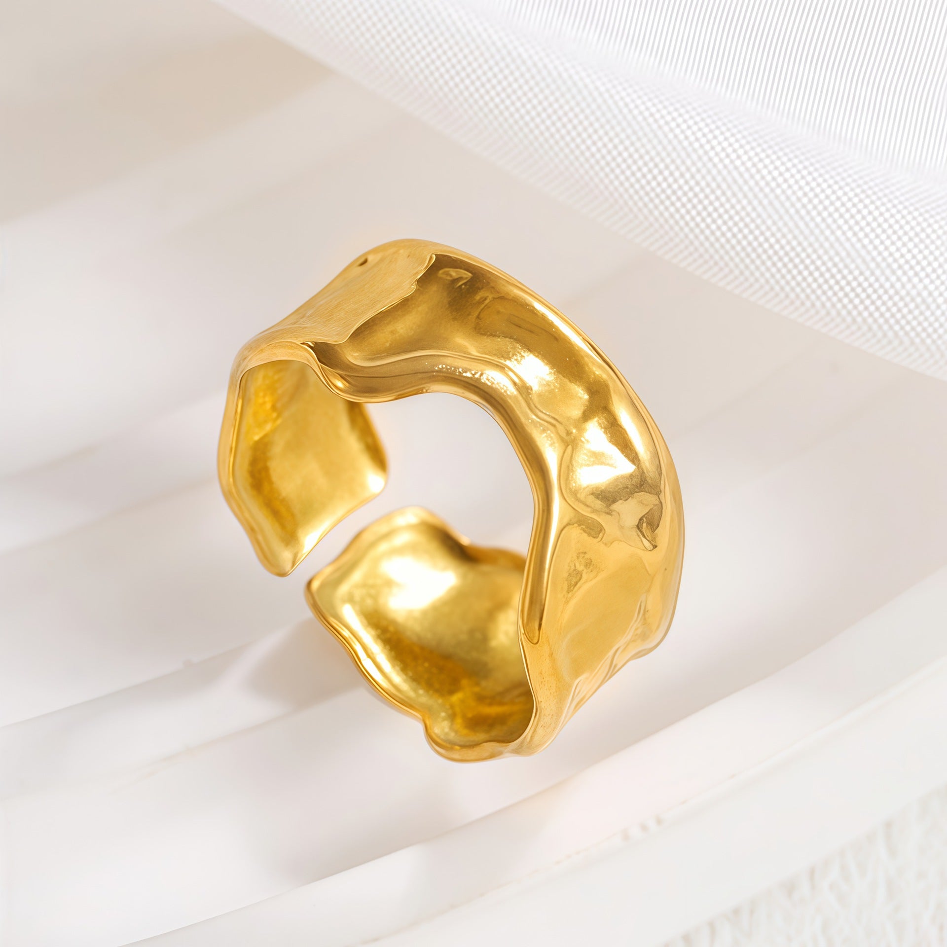 melted edge ring in gold finish; elegant melted edge ring for women