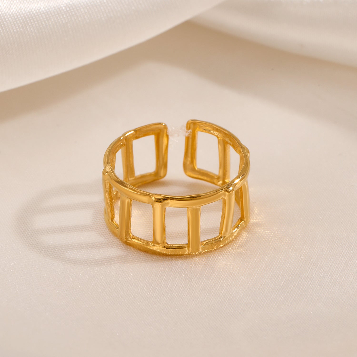 golden grid ring in gold finish; elegant golden grid ring for women