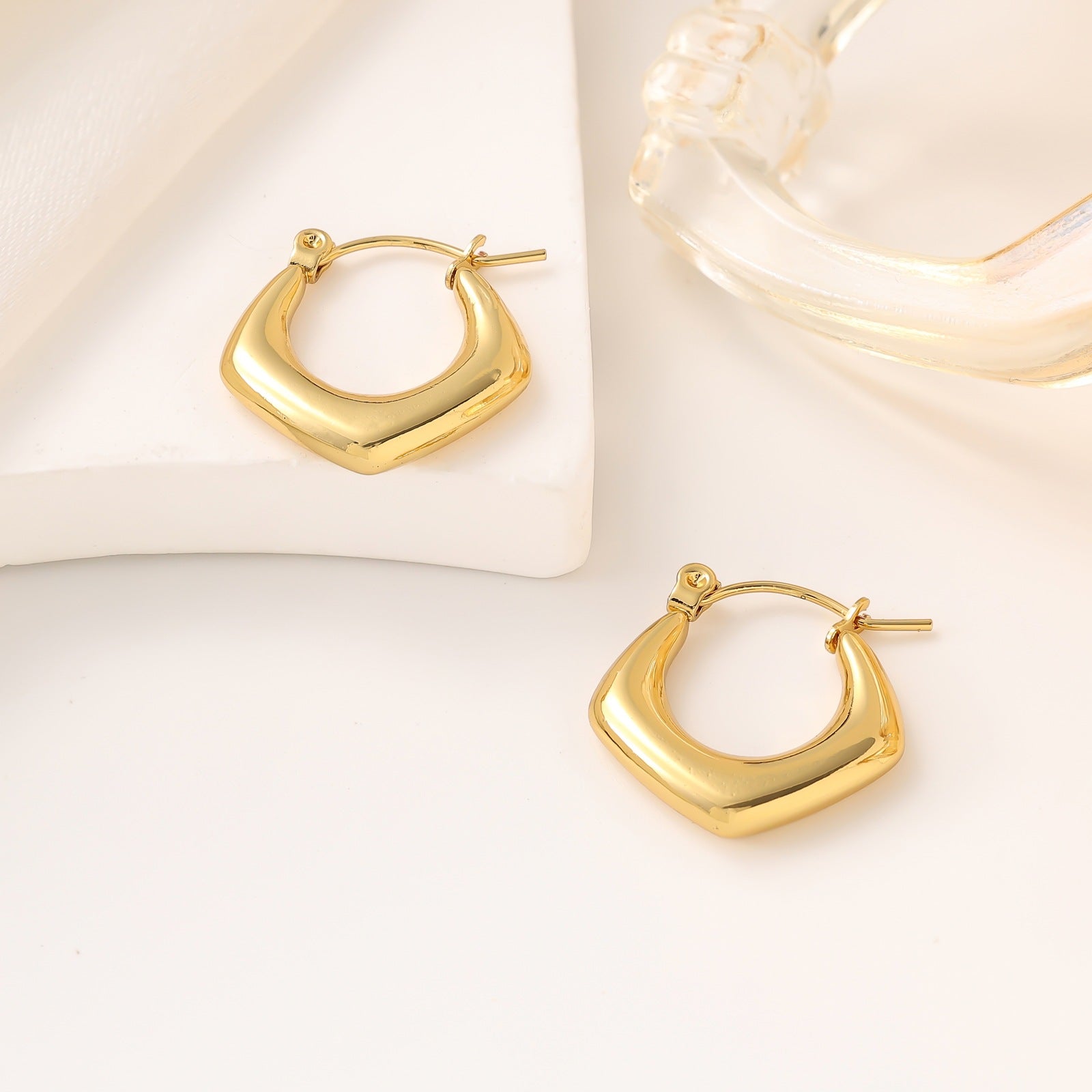 golden edge earrings in gold finish; stylish golden edge earrings for women