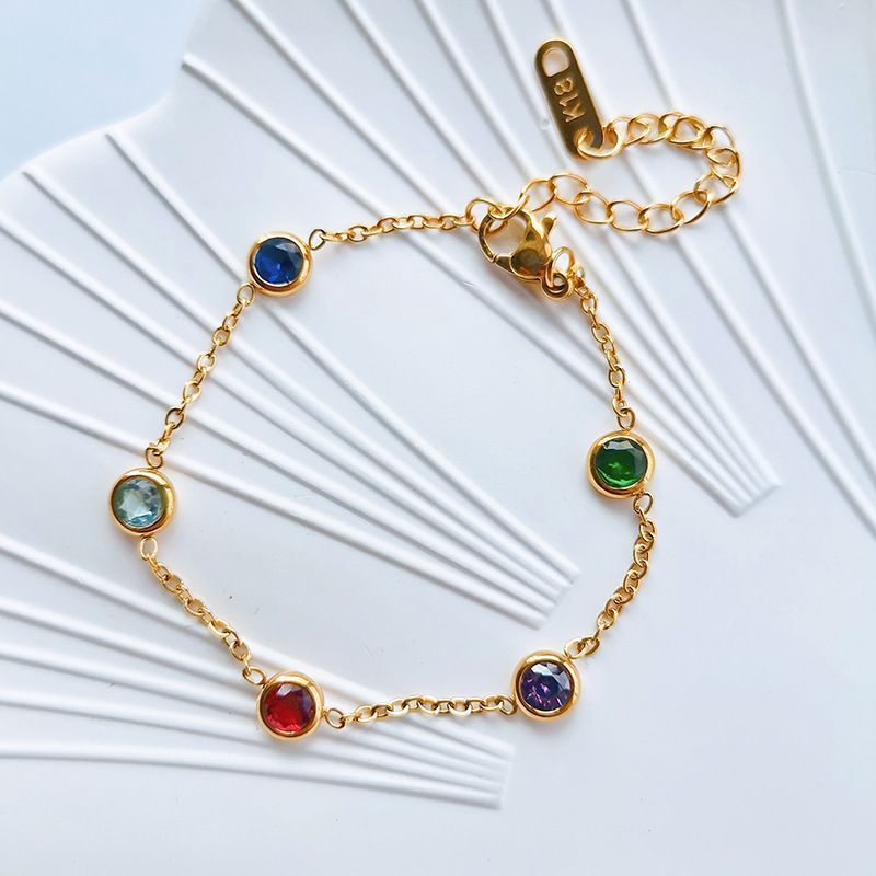 Close-up image of Rainbow Dots Bracelet on a white background
