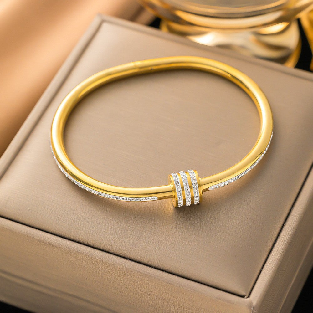 Close-up image of Three Rings Bracelet on a white background