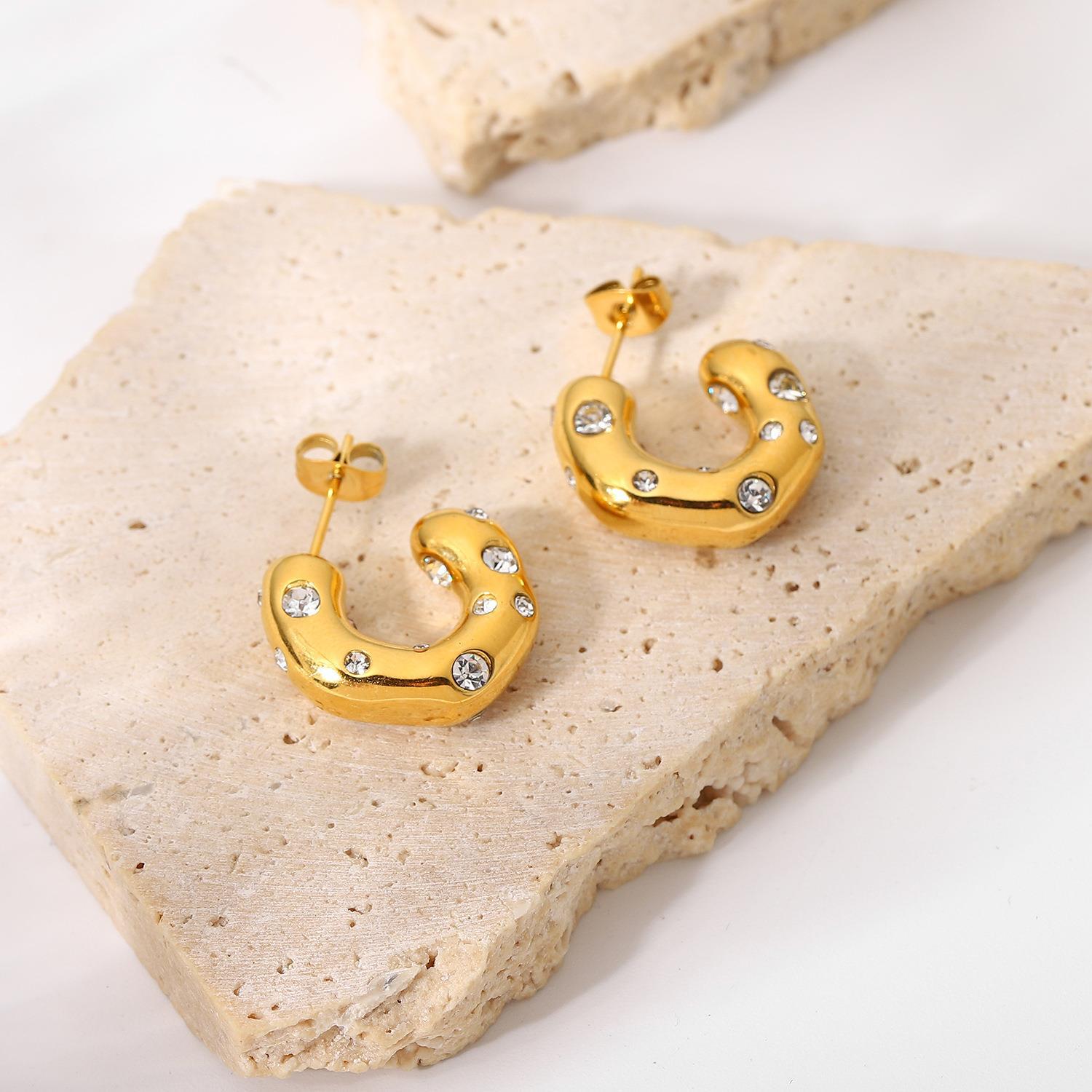gleam loop earrings in gold finish; stylish gleam loop earrings for women