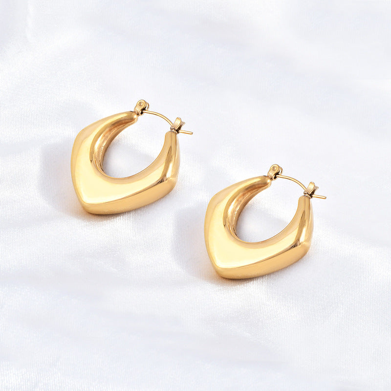 golden edge earrings in gold finish; stylish golden edge earrings for women