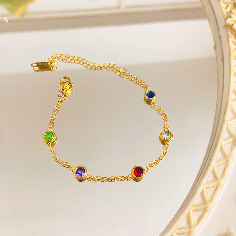 Close-up image of Rainbow Dots Bracelet on a white background