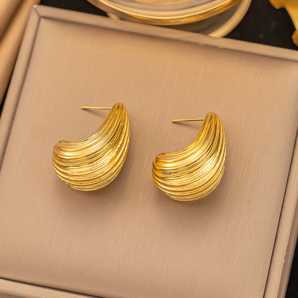 golden crest earrings in gold finish; stylish golden crest earrings for women