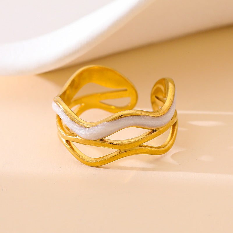 golden wave ring in gold finish; elegant golden wave ring for women