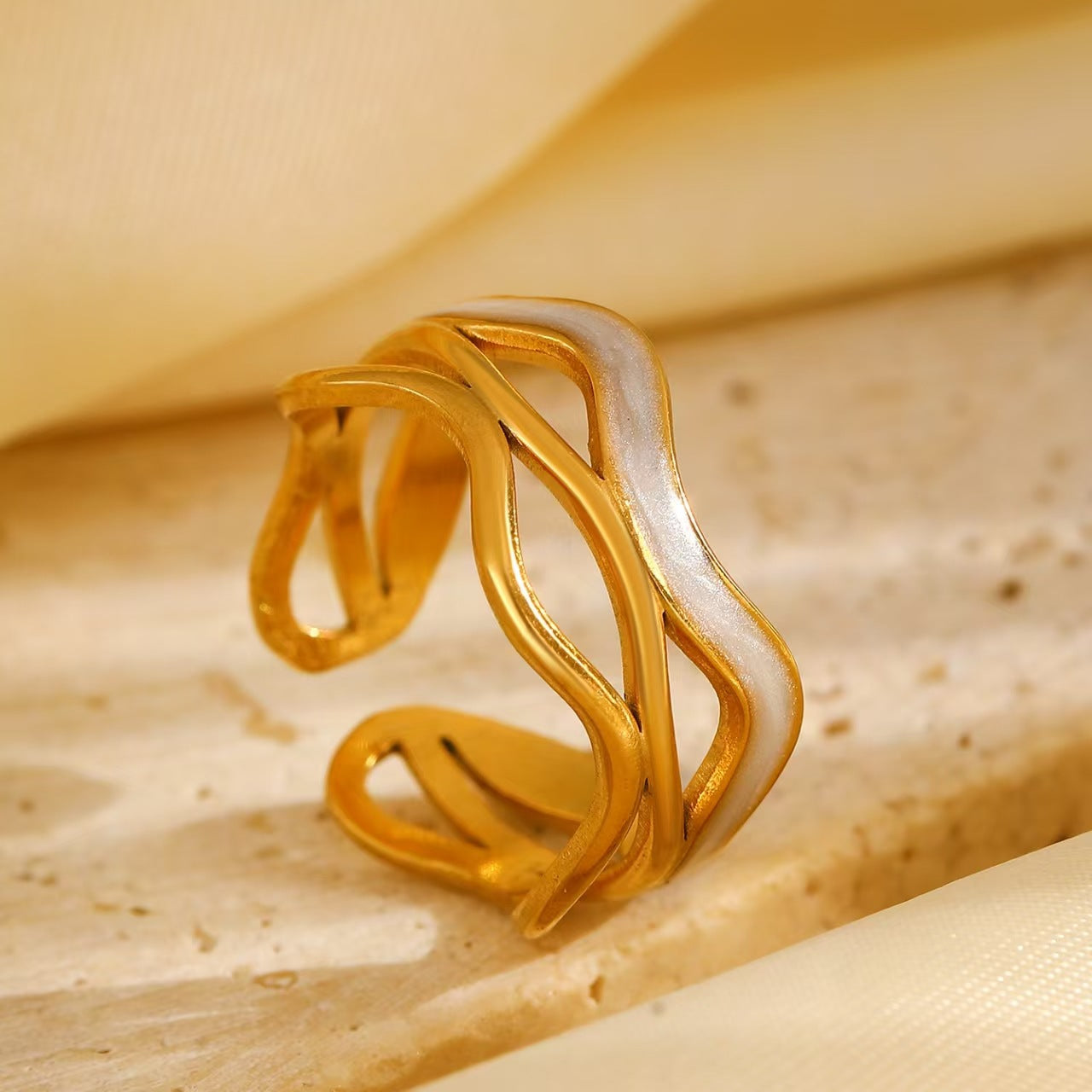 golden wave ring in gold finish; elegant golden wave ring for women