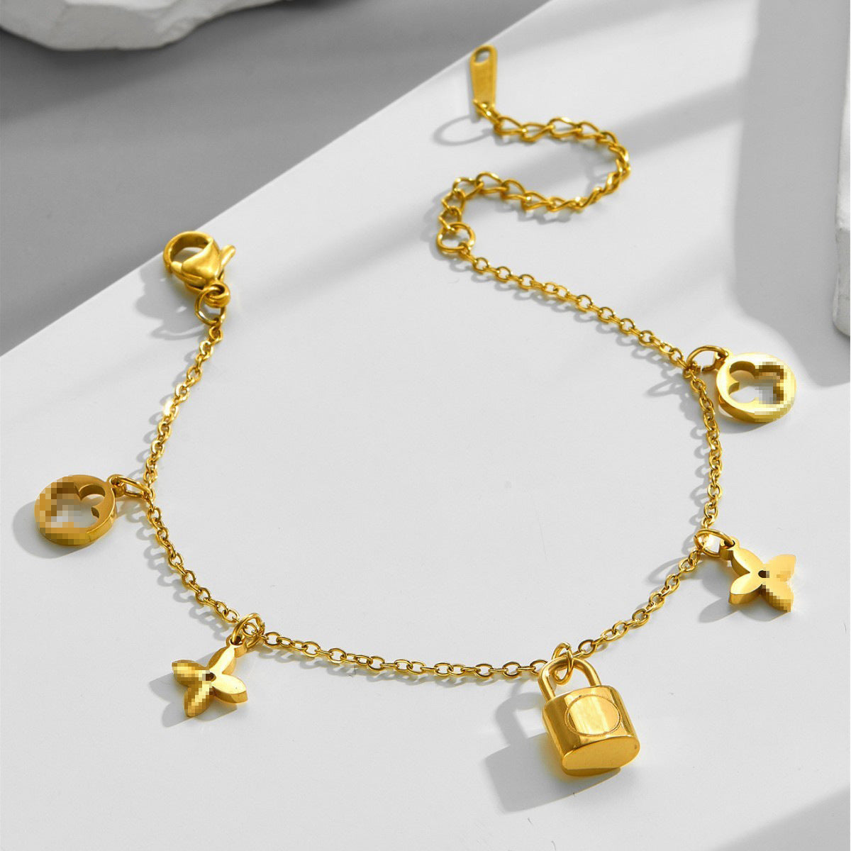 Close-up image of Lock & Bloom Bracelet on a white background