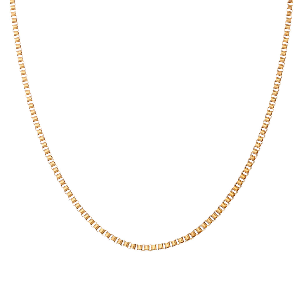 Elegant close-up of Core Luxe 2.0 Chain displayed on a velvet stand