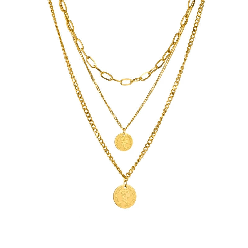 Elegant close-up of Aura Trio Necklace Set displayed on a velvet stand